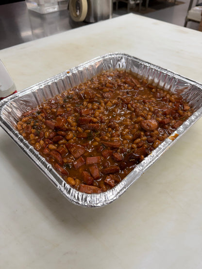 close up of baked beans in a tray